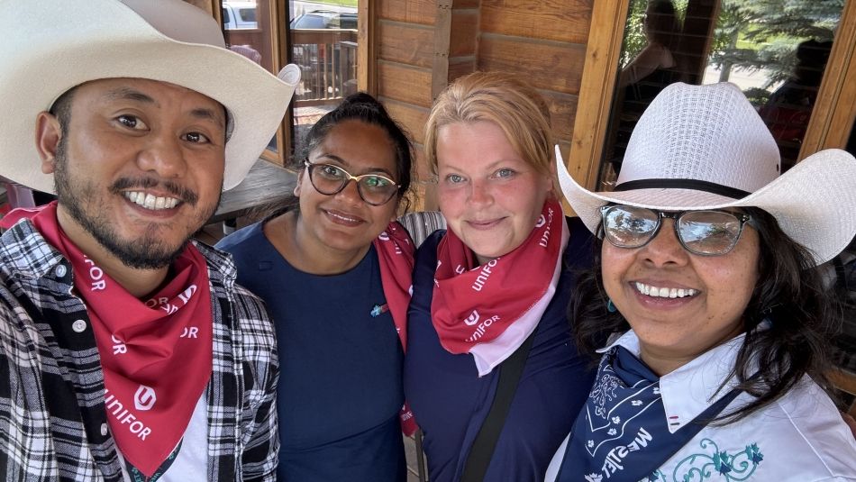 Union members dressed up in cowboy hats, and plaid shirts