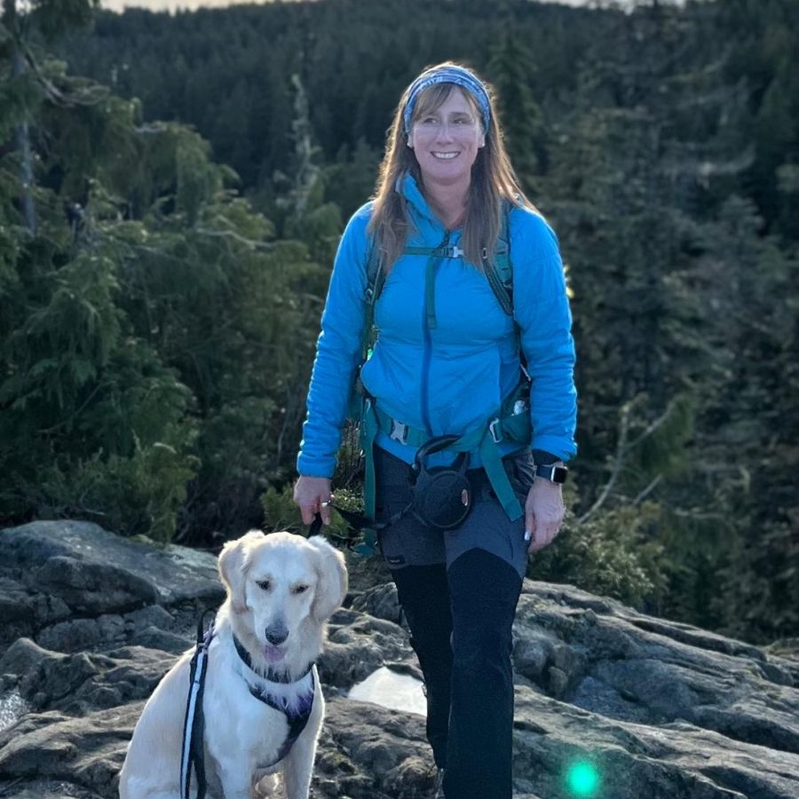 YVR unit chair Heather Benson on a hike with her dog